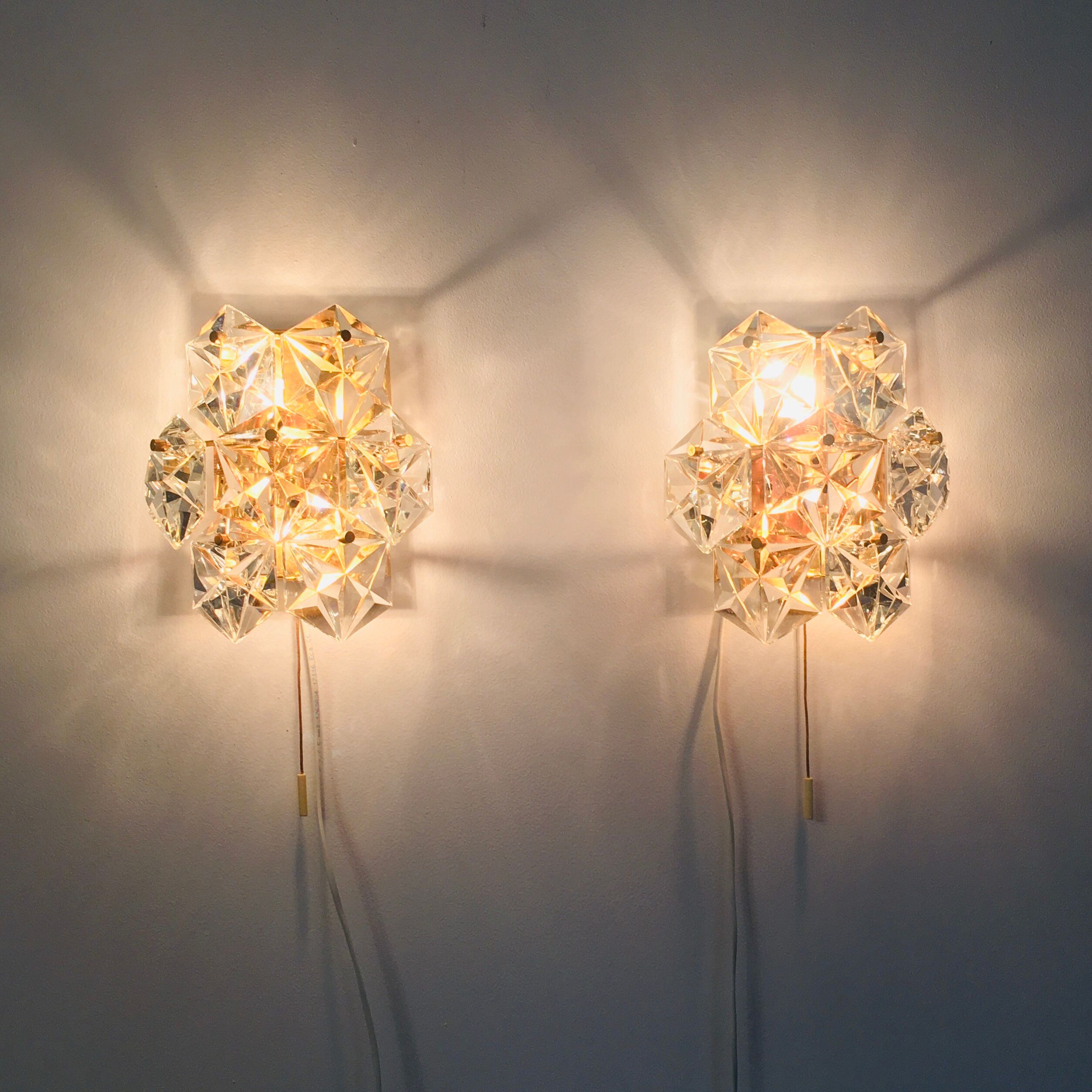Pair of faceted crystal wall lights / sconces by Kinkeldey, Germany, 1970s