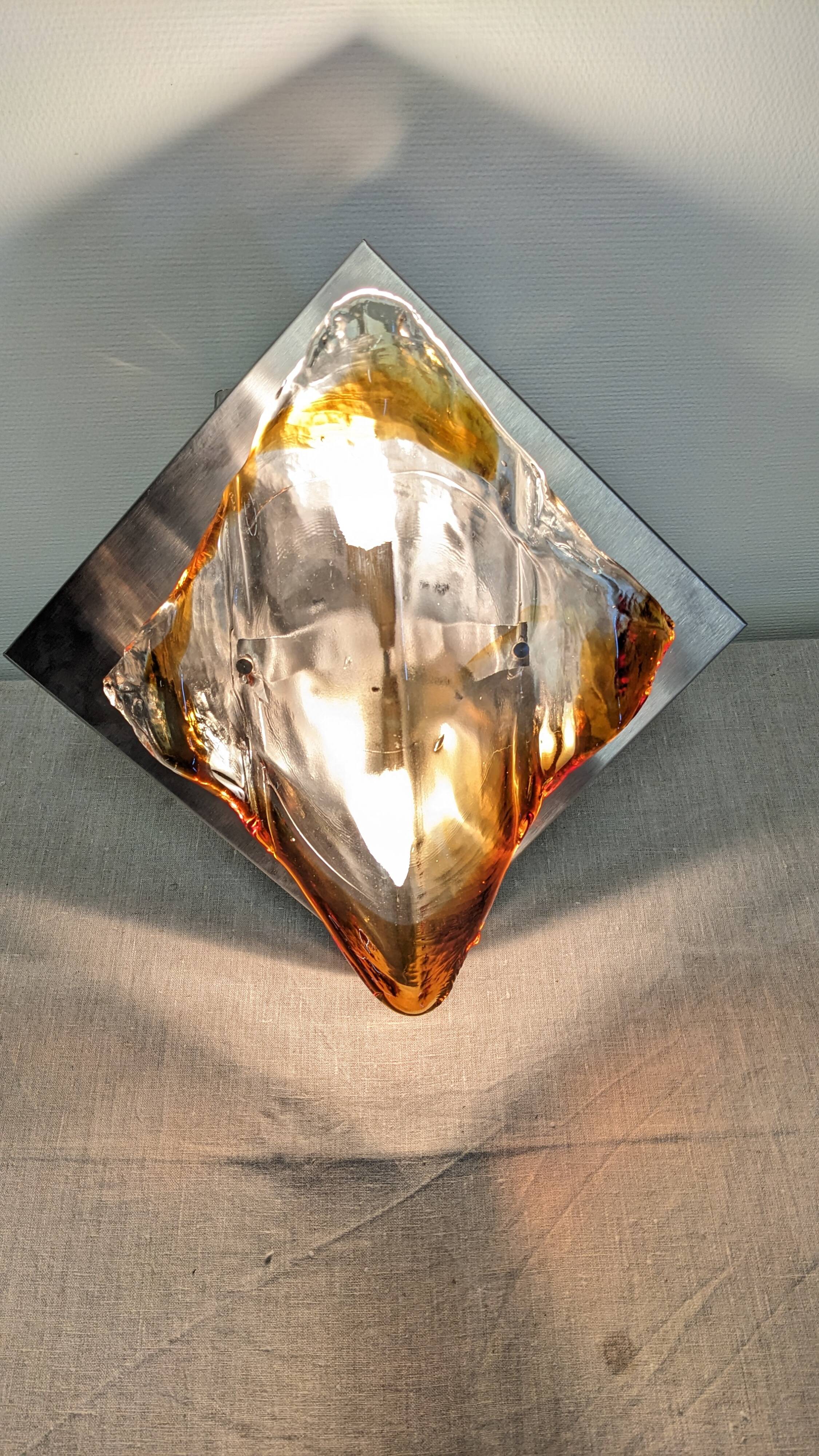 Hollywood Regency wall sconce in Murano glass by Mazzega, Italy circa 1970.