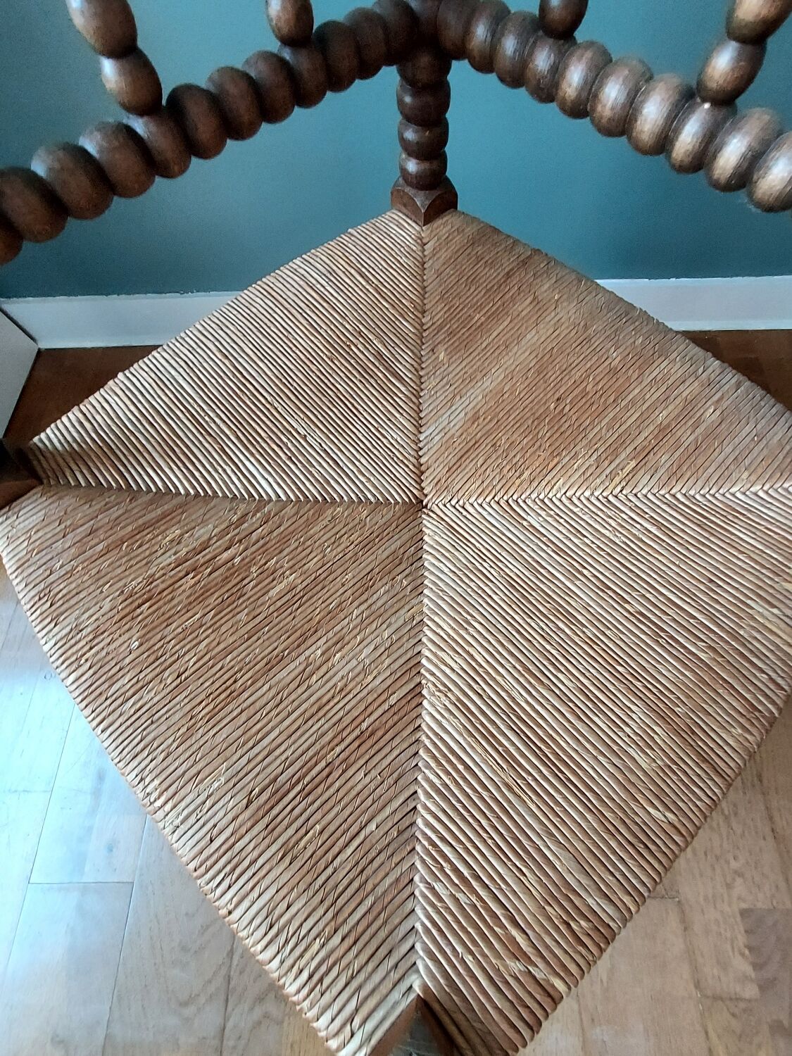 Corner armchair in turned wood