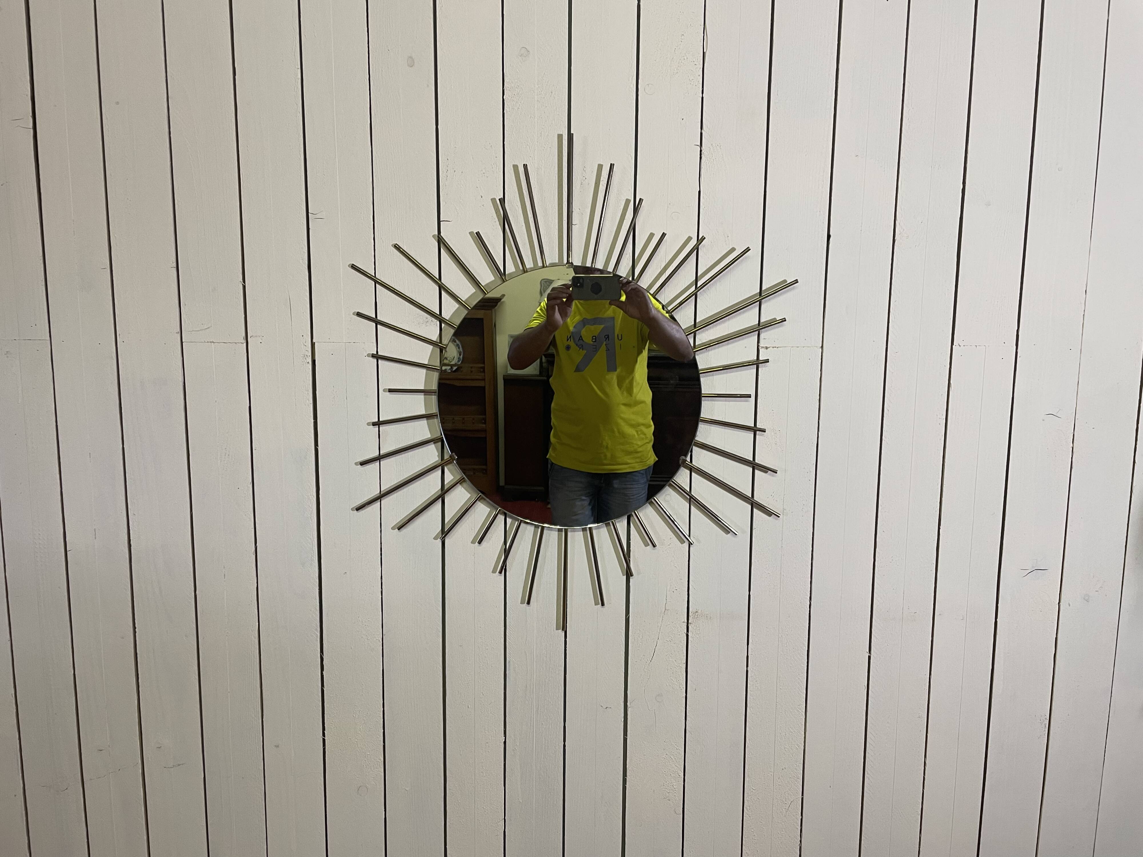 Golden metal sun mirror year 60