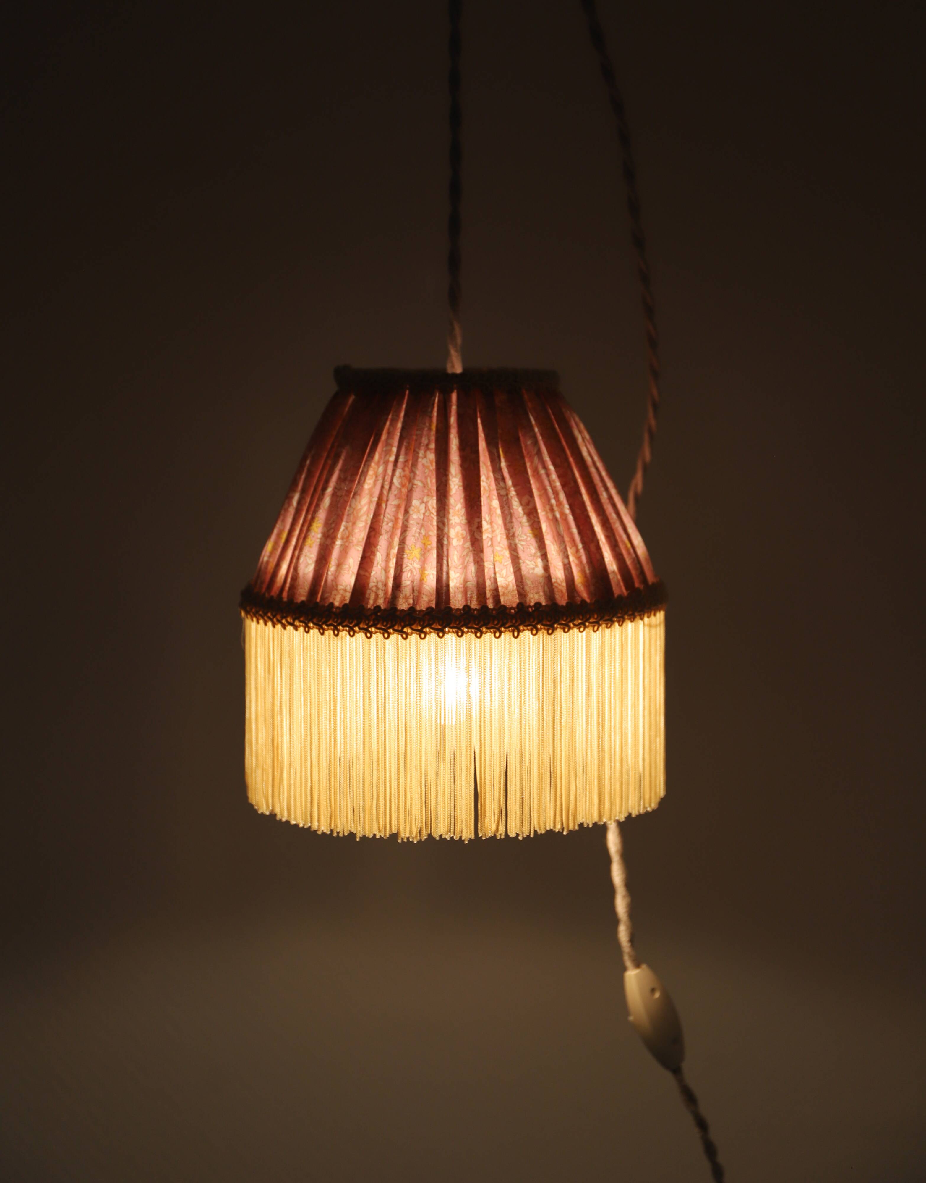 Small floral portable lamp with fringed finish