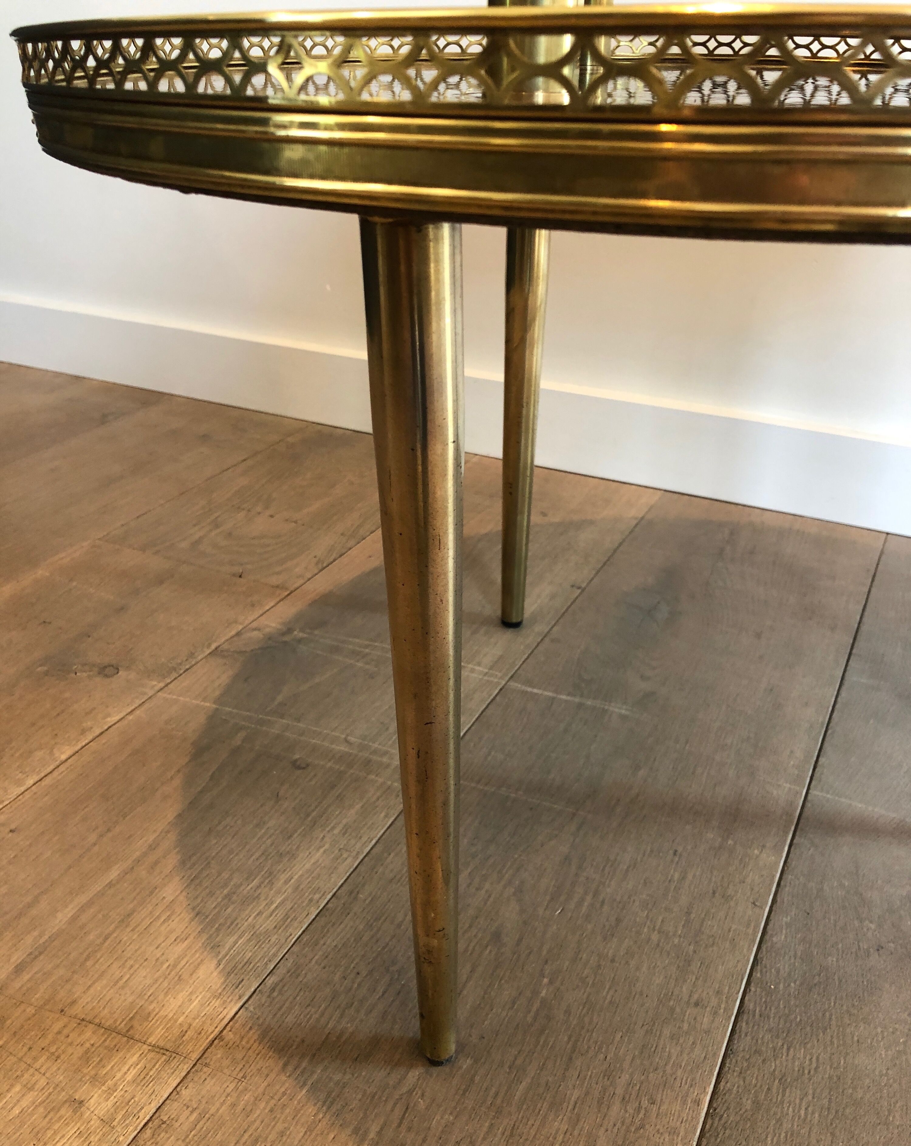 Neoclassical style tripod pedestal in mahogany, brass