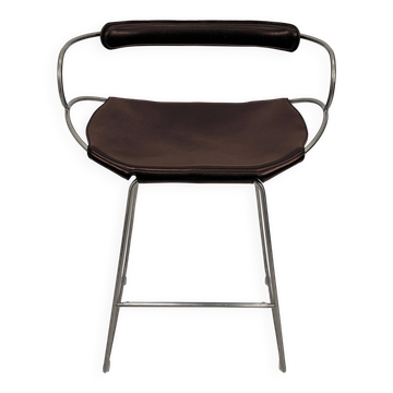Contemporary bar stool with a metal aged silver backrest and dark brown leather.