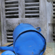 Blue zinc watering can