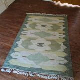 Green Scandinavian kilim carpet