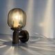 Pair of yellow glass and brass wall lights from the mid-century by N Leuchten, 1960s, Germany.