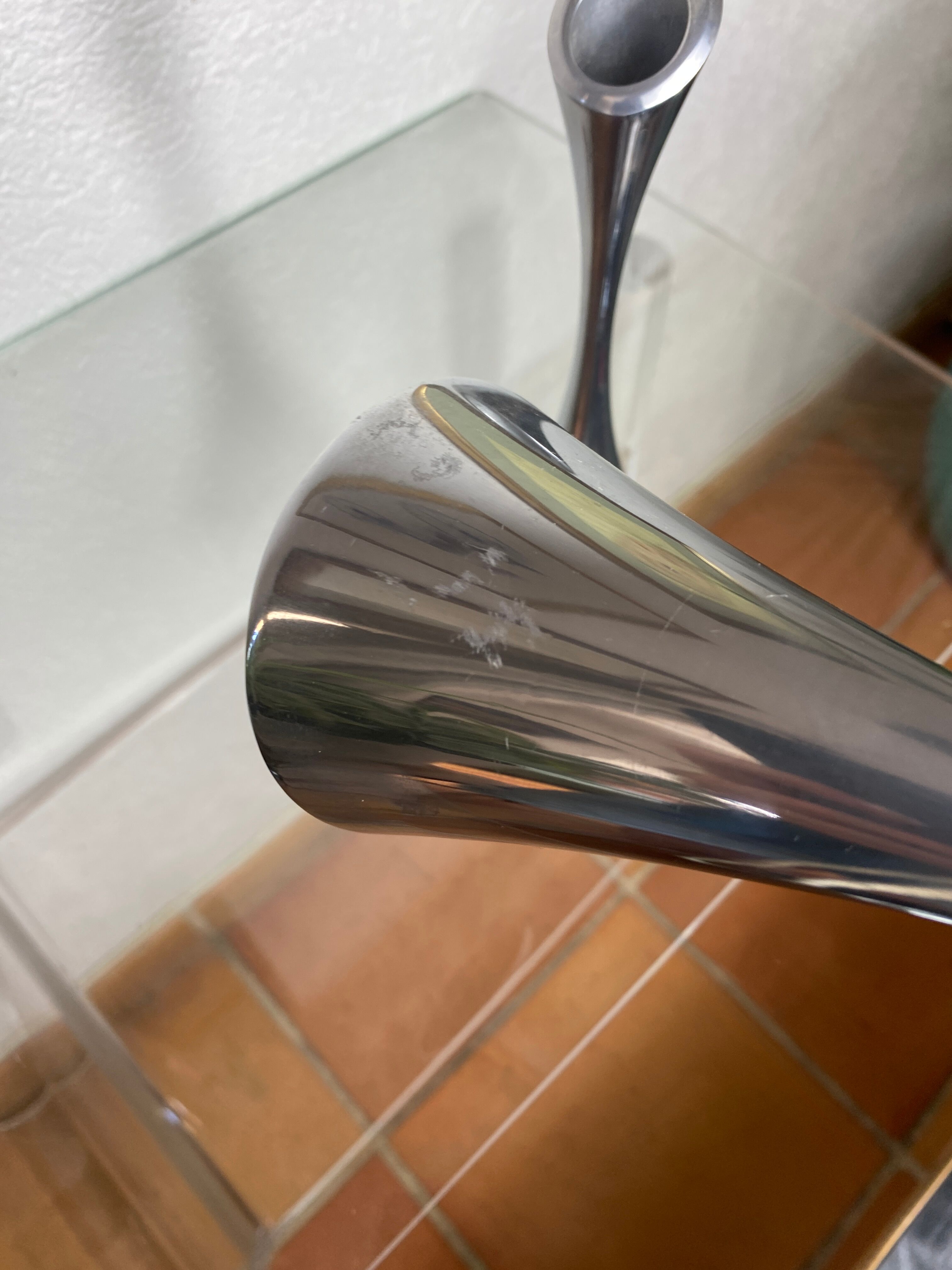 Pair of designer candle holders in stainless steel