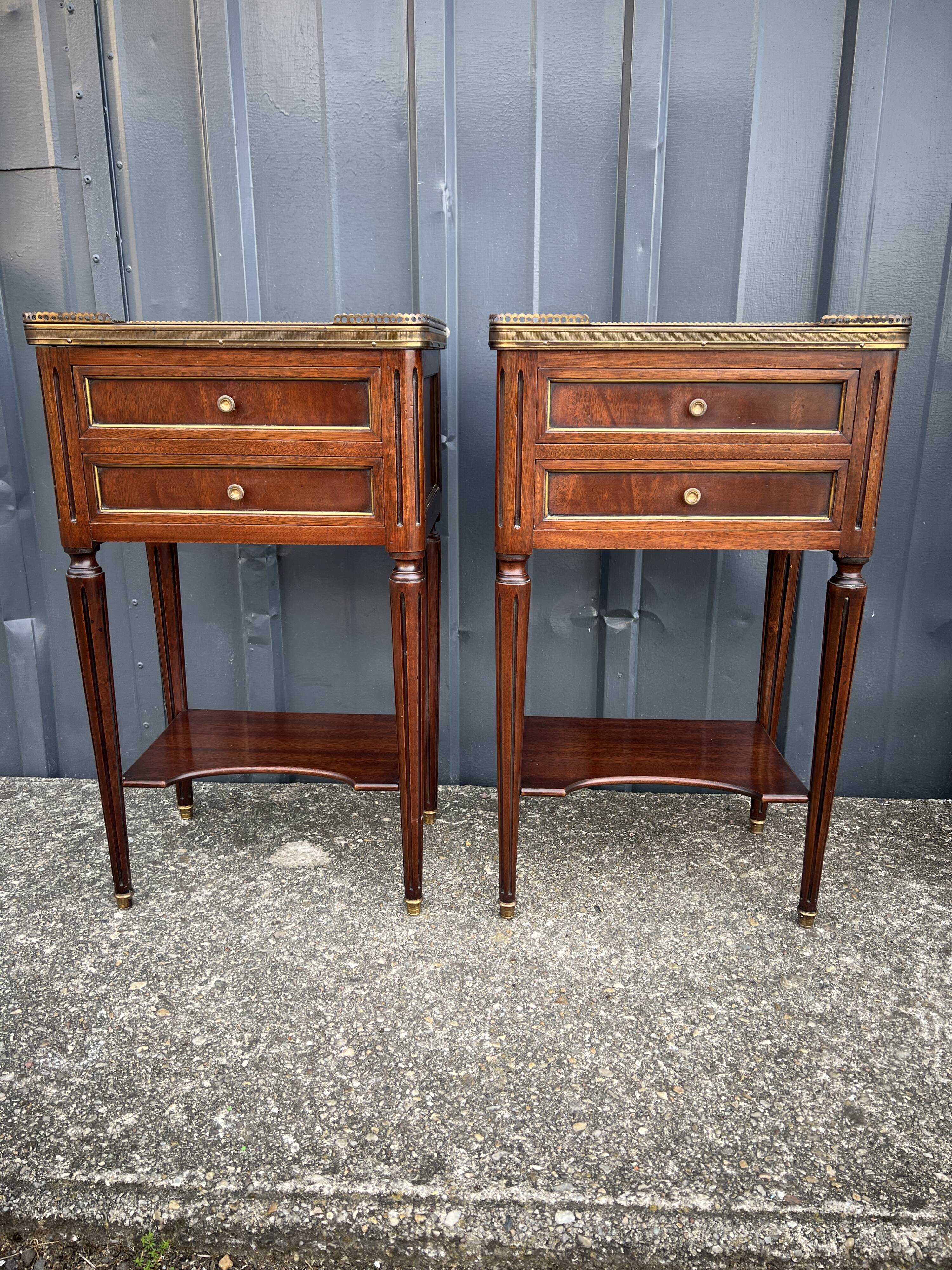 Pair of mahogany bedside tables, marble top, Louis XVI style