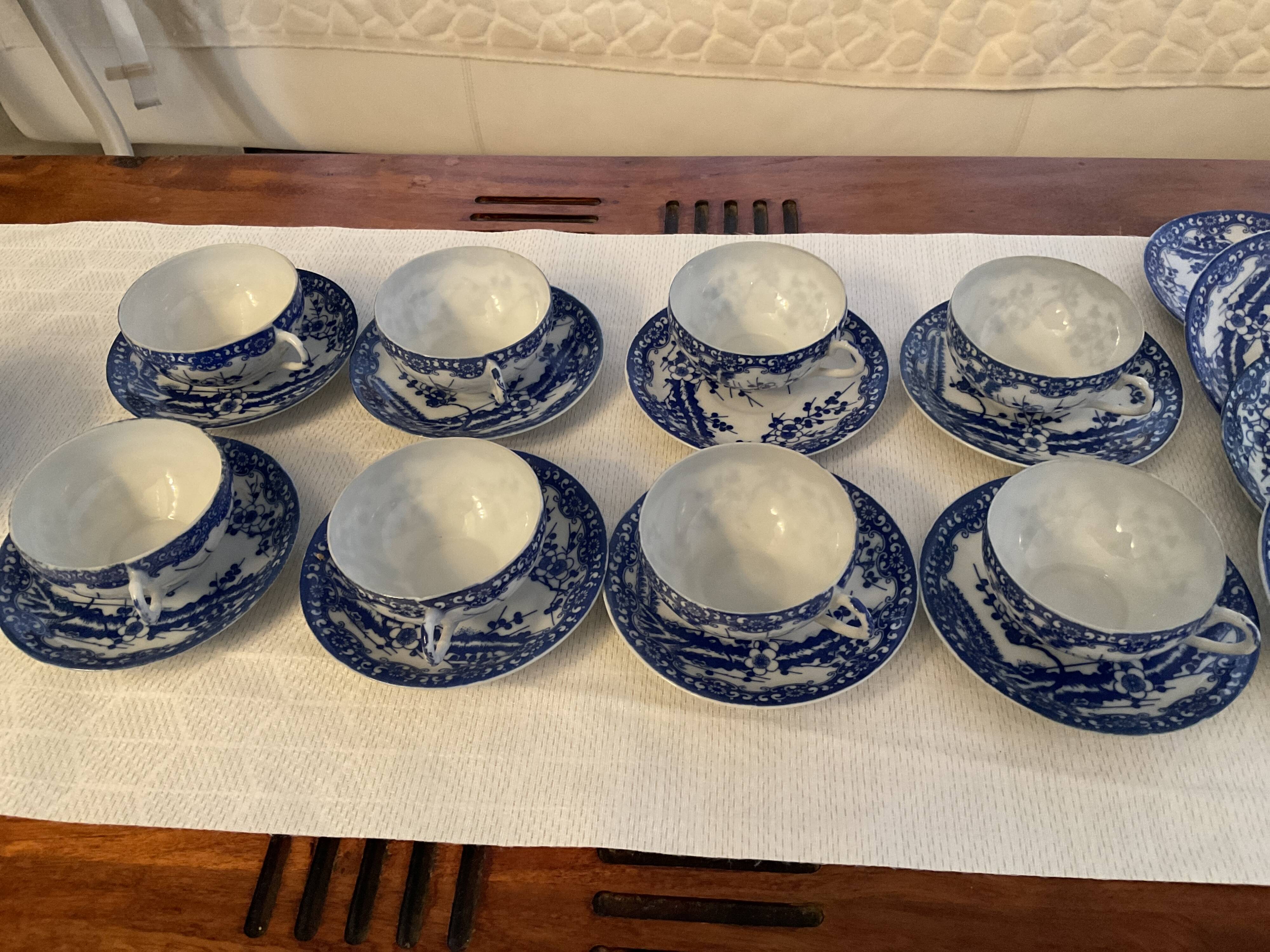 Japanese tea service with cherry blossom decoration in fine porcelain.