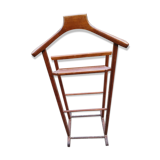 Valet wearing double wood coat rack