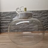 Glass globe pendant light with marble