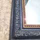 Antique mirror in Napoléon III style, blackened with beaded frieze, 42x55cm.