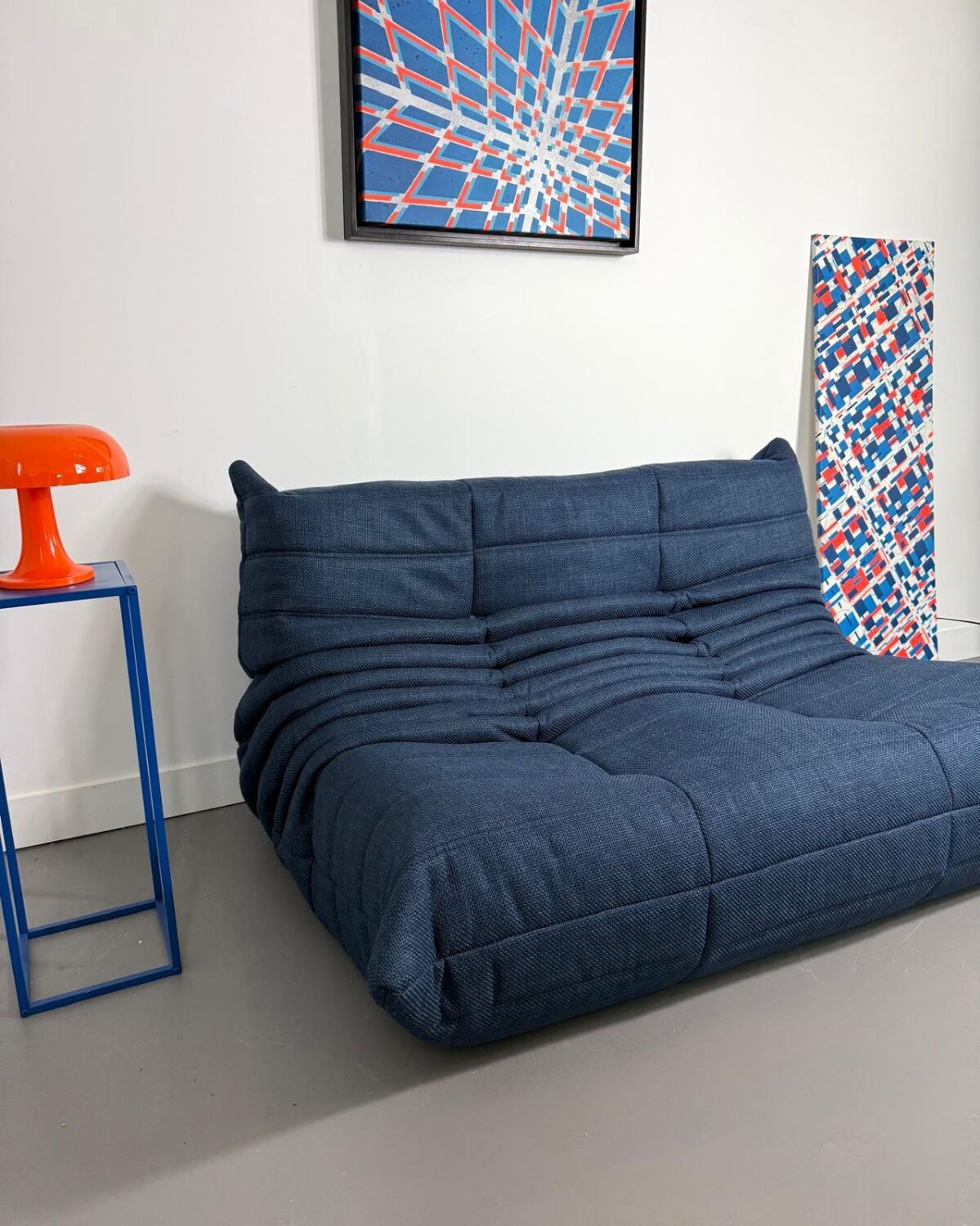 Two-seater sofa reupholstered.