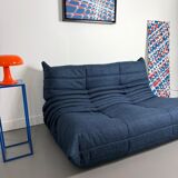 Two-seater sofa reupholstered.