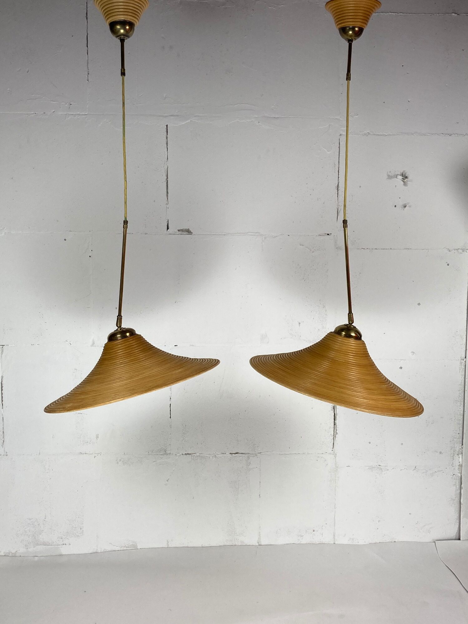 Pair pencil reed rattan bamboo and brass pendants, Italy 1970s