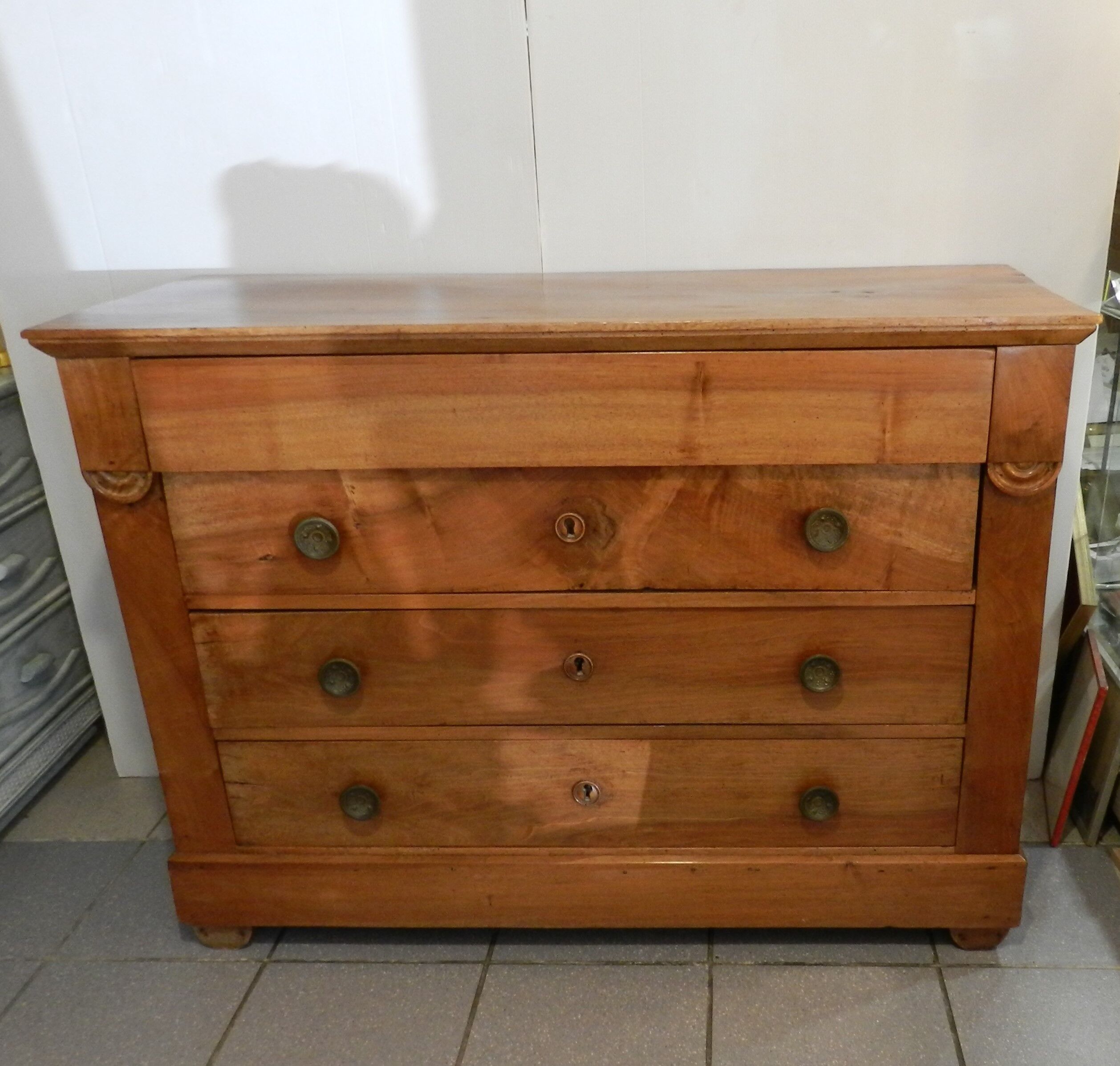 Empire style chest of drawers in blond walnut