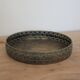 Round metal plate in patinated gold with an openwork border – D30 cm