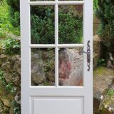 Old wooden door with small squares
