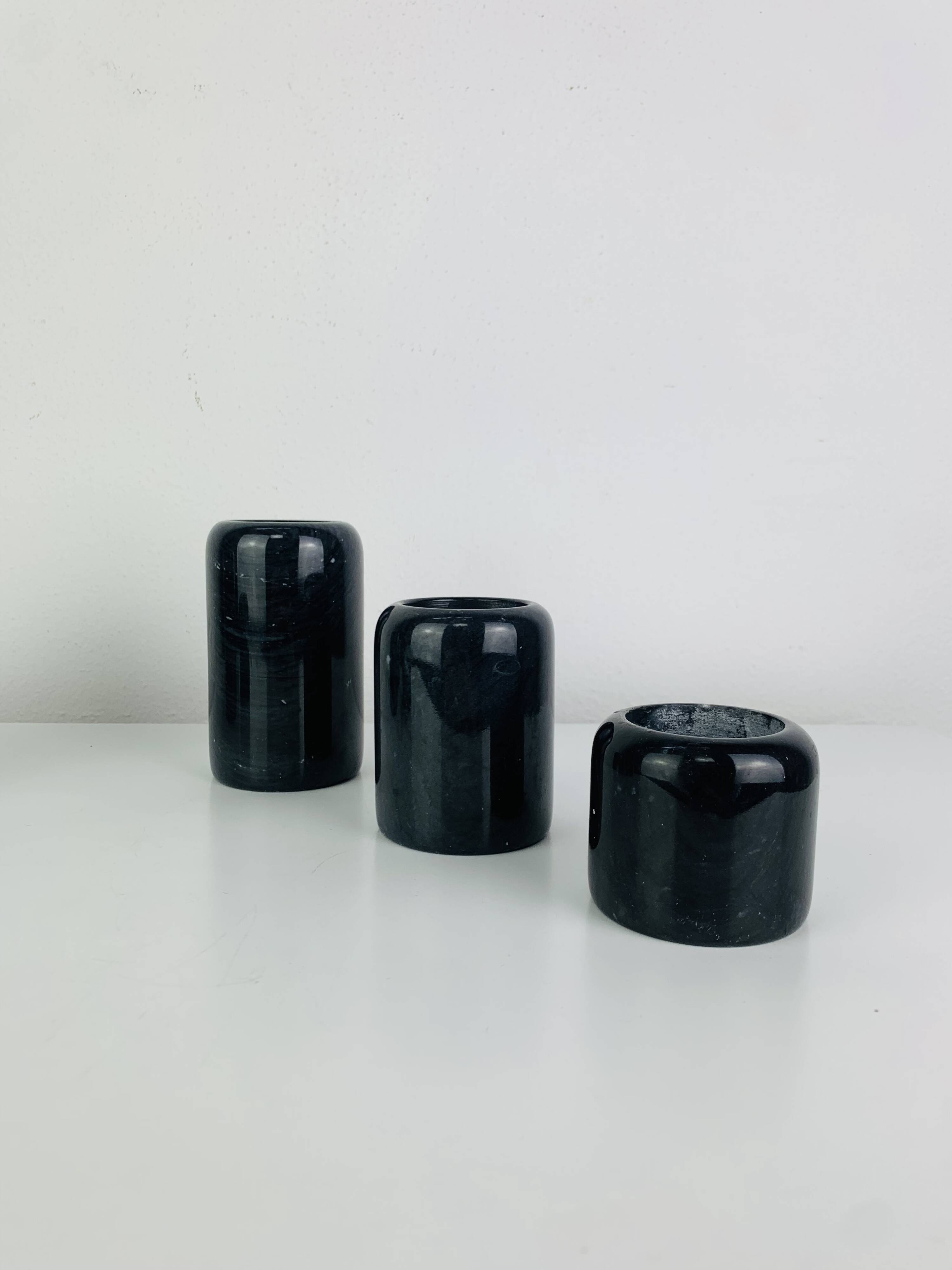 Vintage black marble candlestick trio