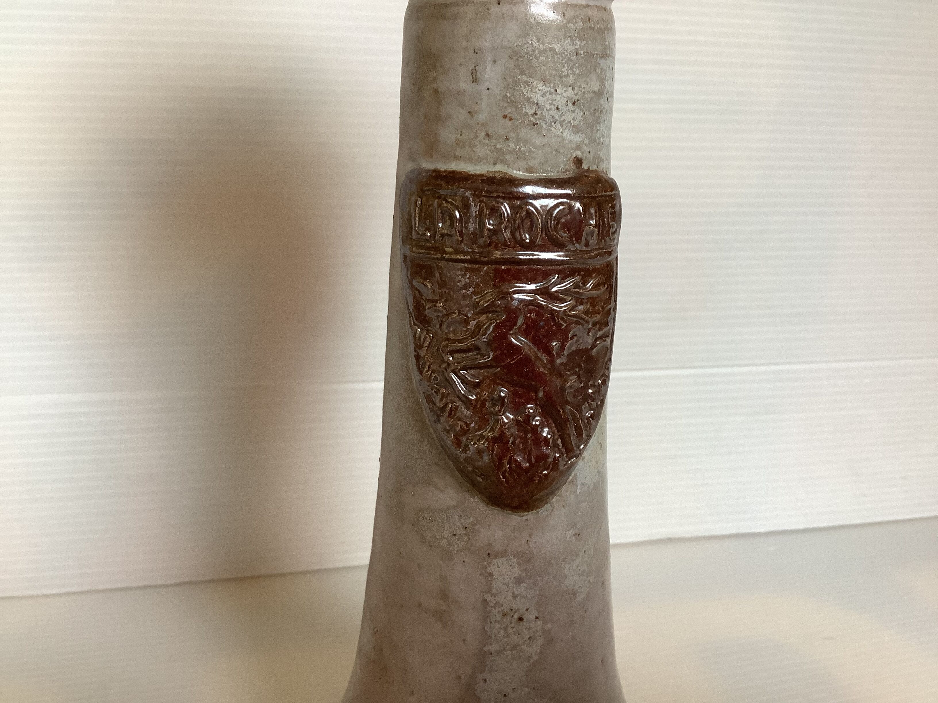 Bouffioulx style stoneware candle holder with a coat of arms