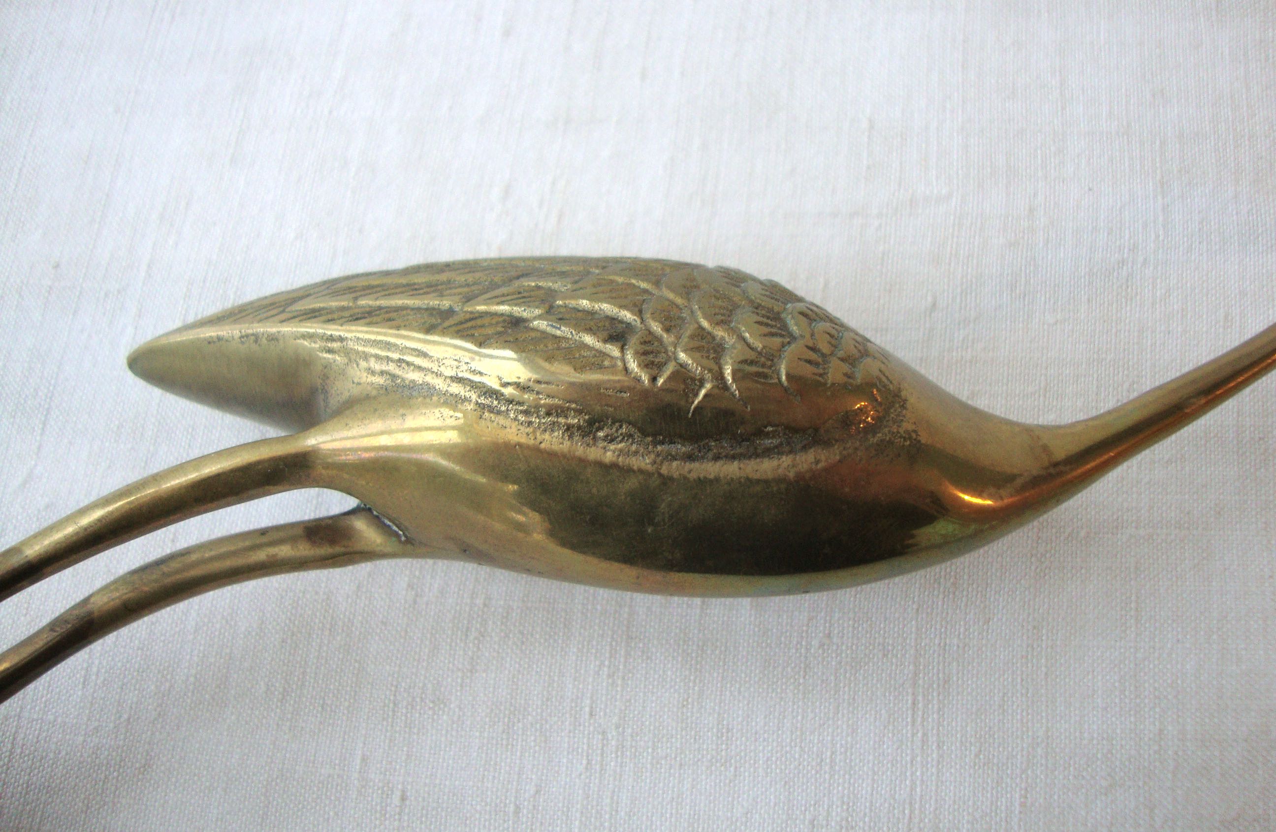 Brass heron
