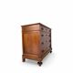 Antique walnut commode with bronze handles in the shape of a lion's mask,