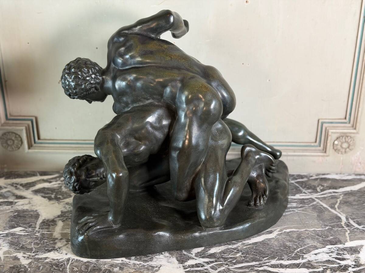 Large bronze after the antique preserved in the Uffizi in Florence, the wrestlers around 1880.