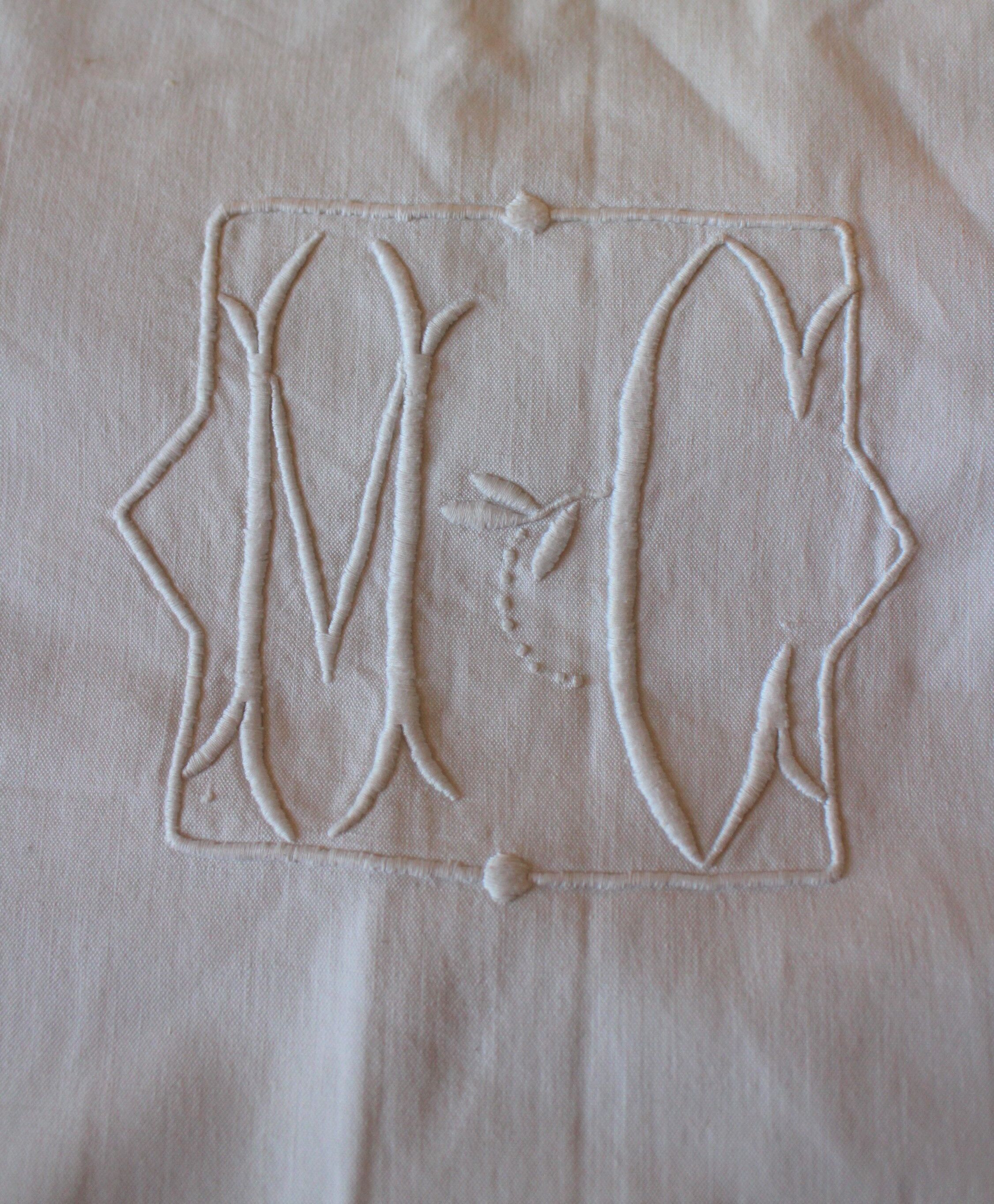 Old white sheet Monograms M C