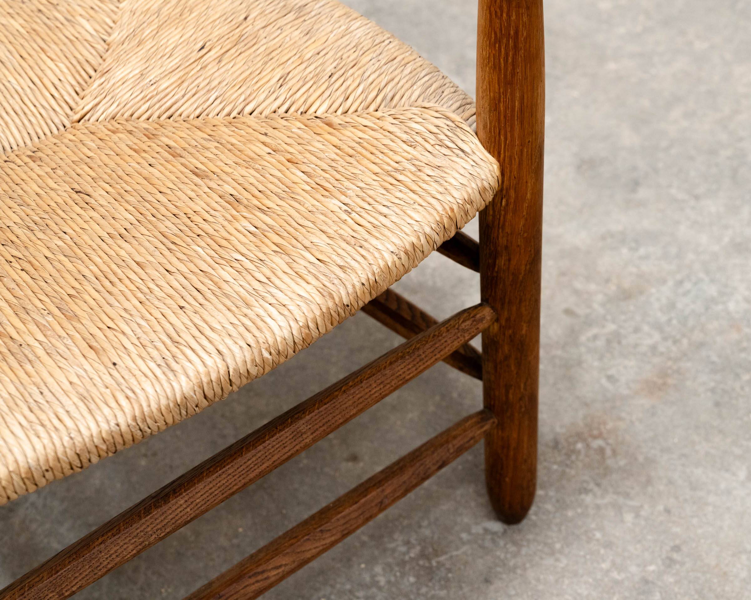 Fauteuil chêne et paille dans l’esprit de Charlotte Perriand 1950