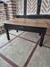 Antique black raw wood coffee table