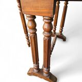 “Gateleg” folding walnut table