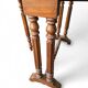 “Gateleg” folding walnut table