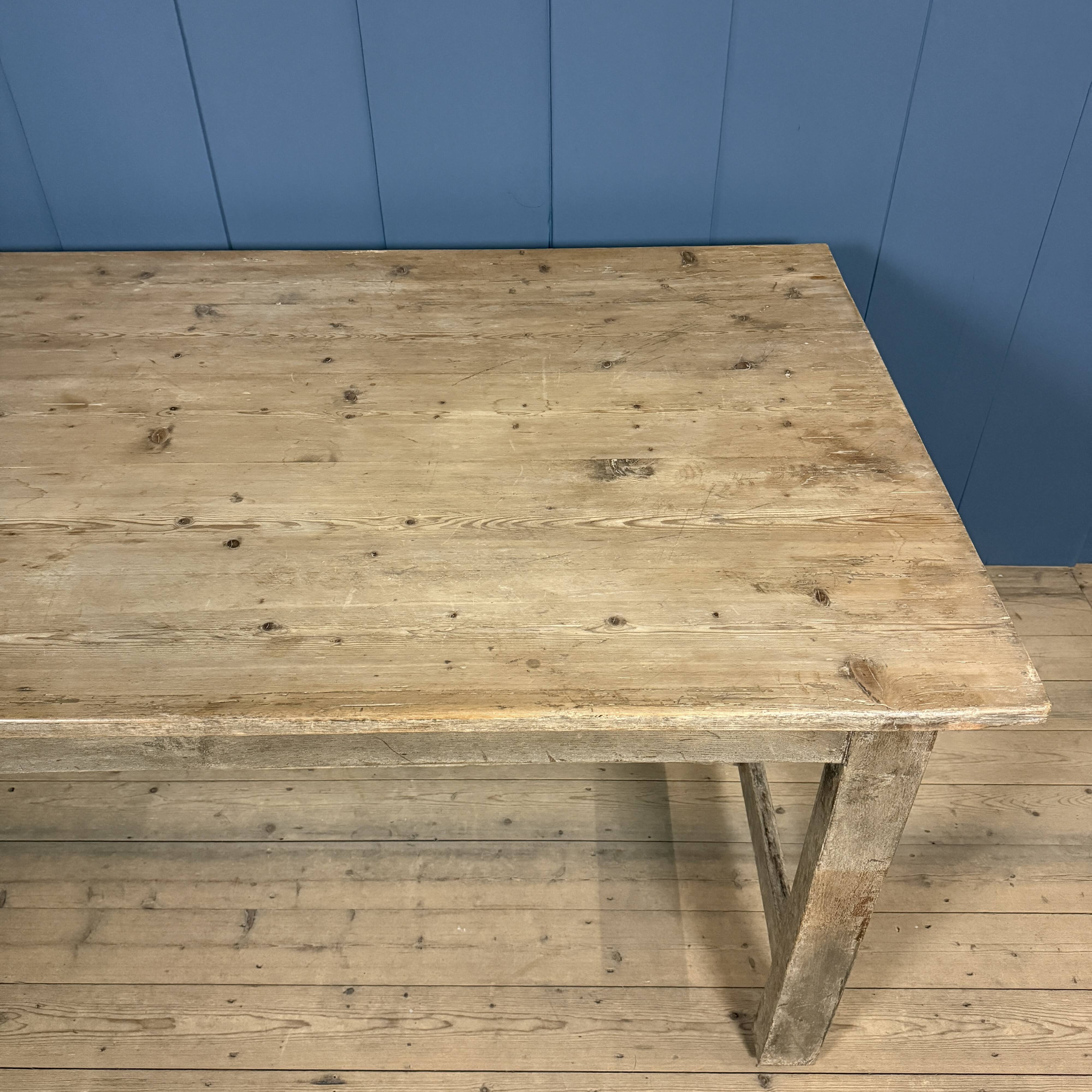 French farmhouse dining table with pine top and oak base