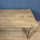 French farmhouse dining table with pine top and oak base