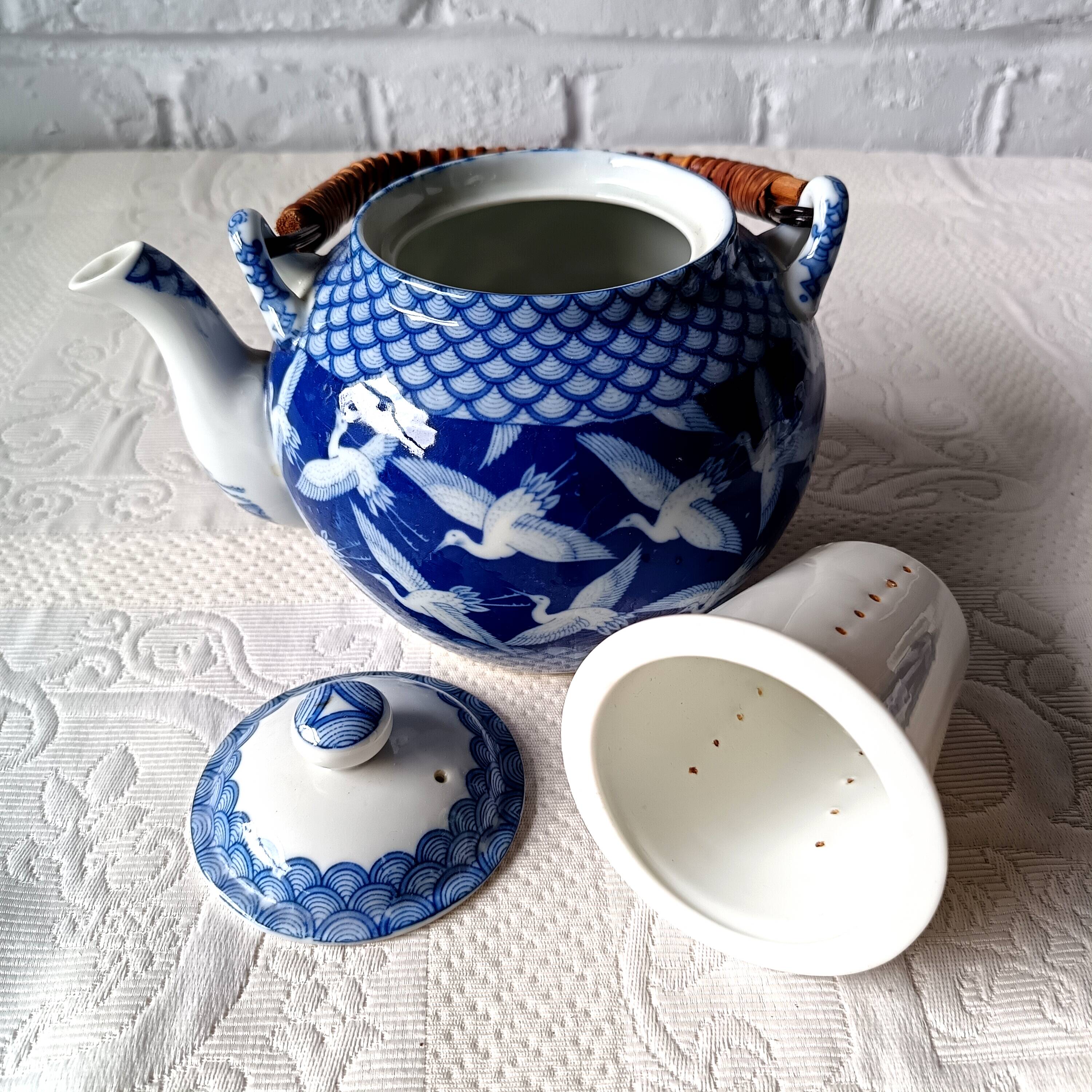 Japanese tea set in fine porcelain with crane motif