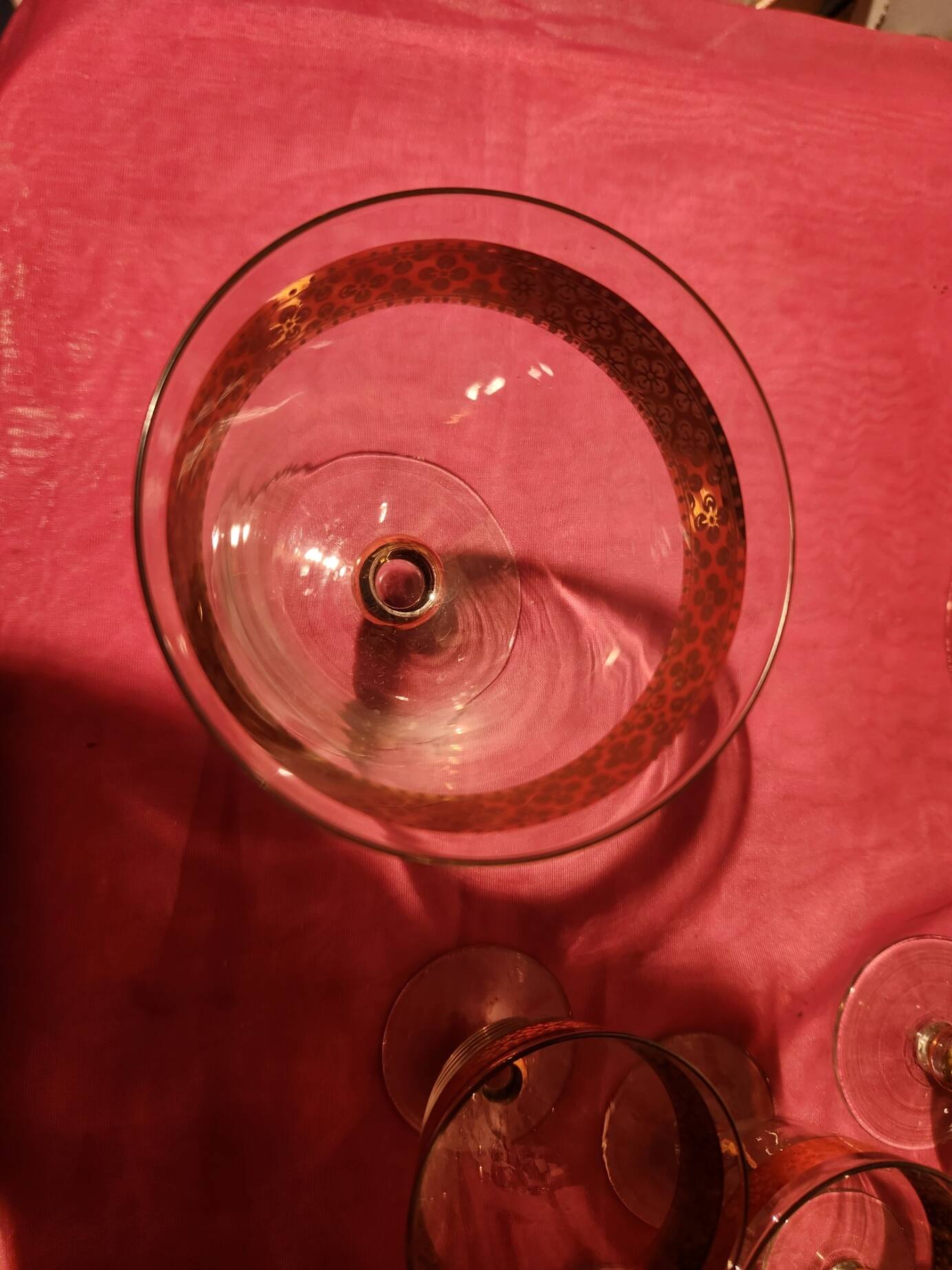 1930s footed glass service with gilding, including champagne flutes.