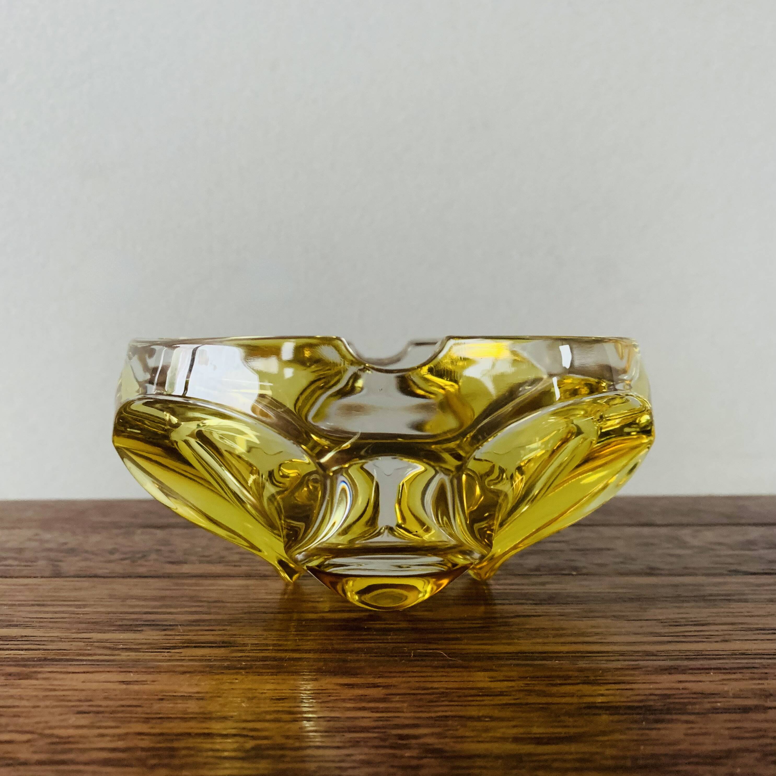 Vintage ashtray in yellow and transparent molded glass