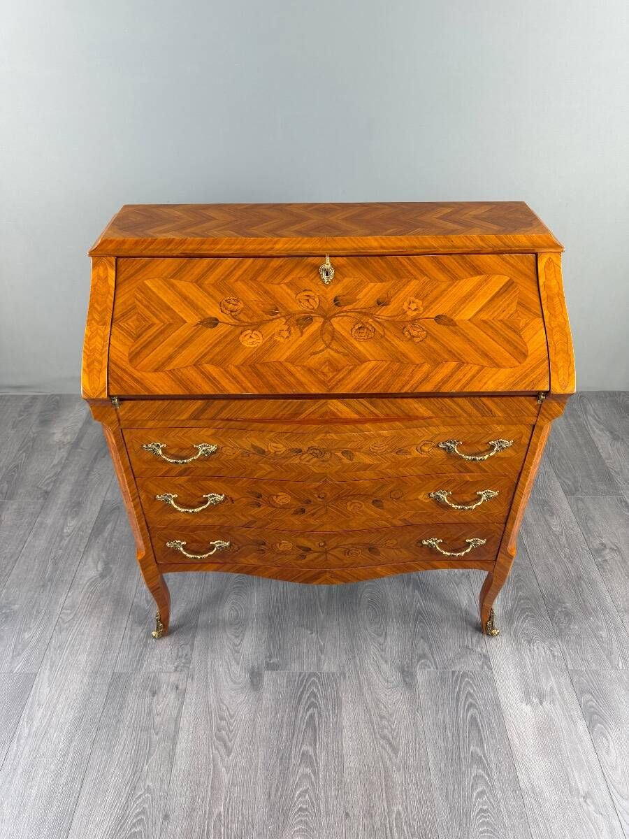 Louis XV style writing desk with a drop-leaf, made of veneer and marquetry, 19th century.