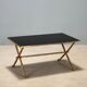 Coffee table from the 1950s-60s with a brass base.