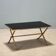 Coffee table from the 1950s-60s with a brass base.