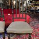 Fake pair of low Napoleon III chairs in blackened wood.