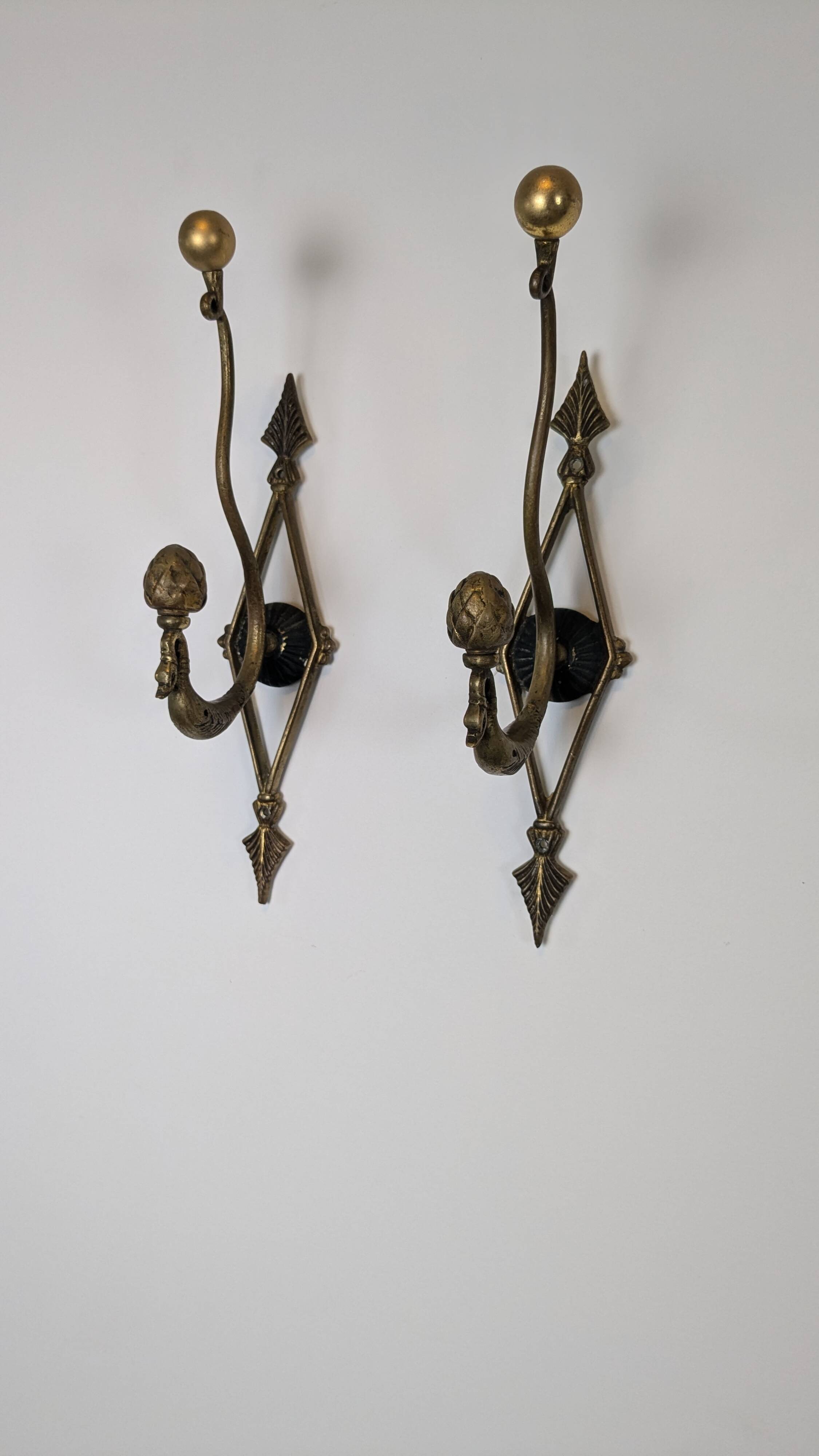 Antique pair of brass coat hooks