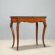 Game table in Indian rosewood and mahogany