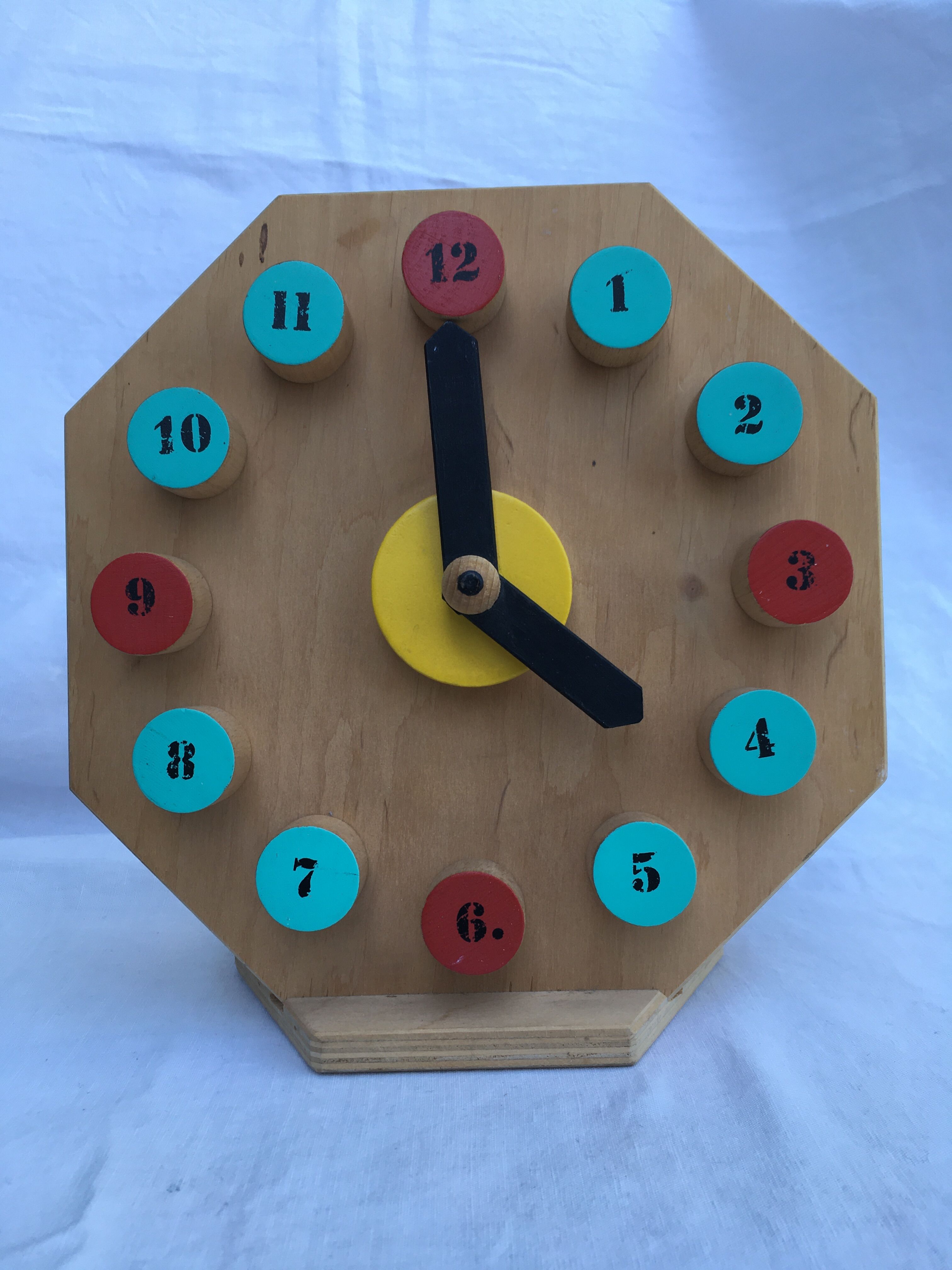 Painted wooden toy clock