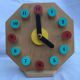 Painted wooden toy clock