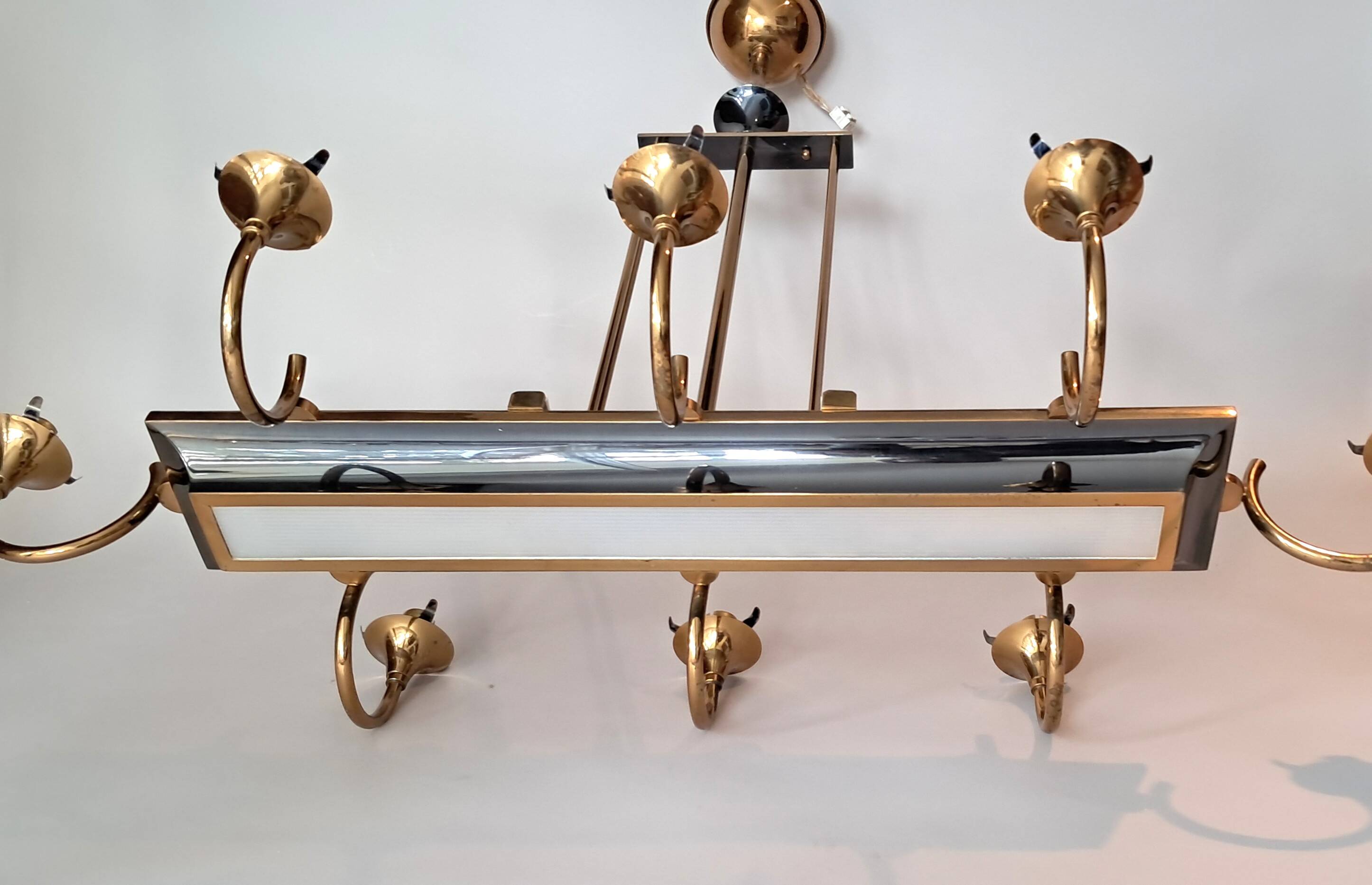 Eight-light chandelier in gilded brass and blue, 1950.