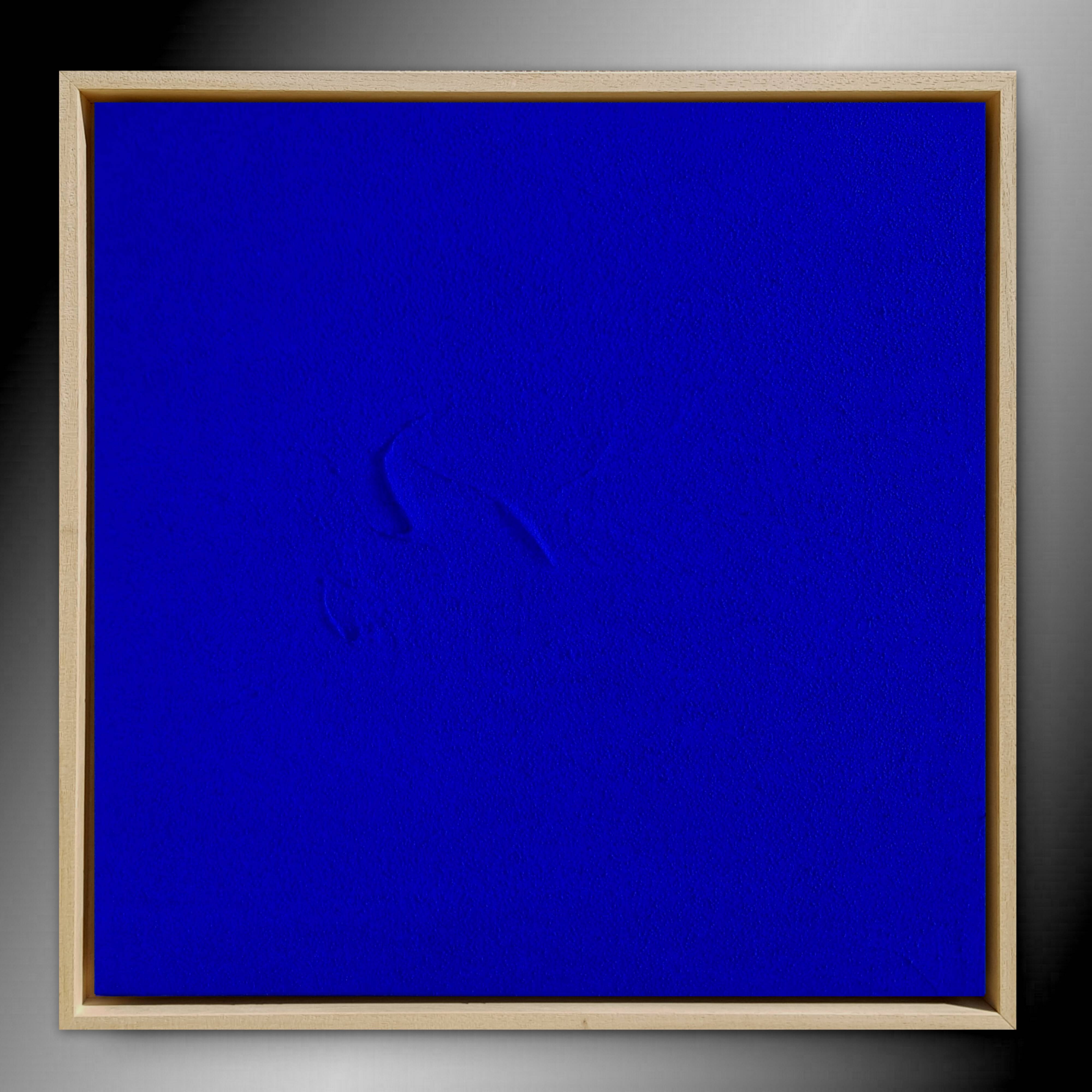 Framed monochrome blue abstract painting.