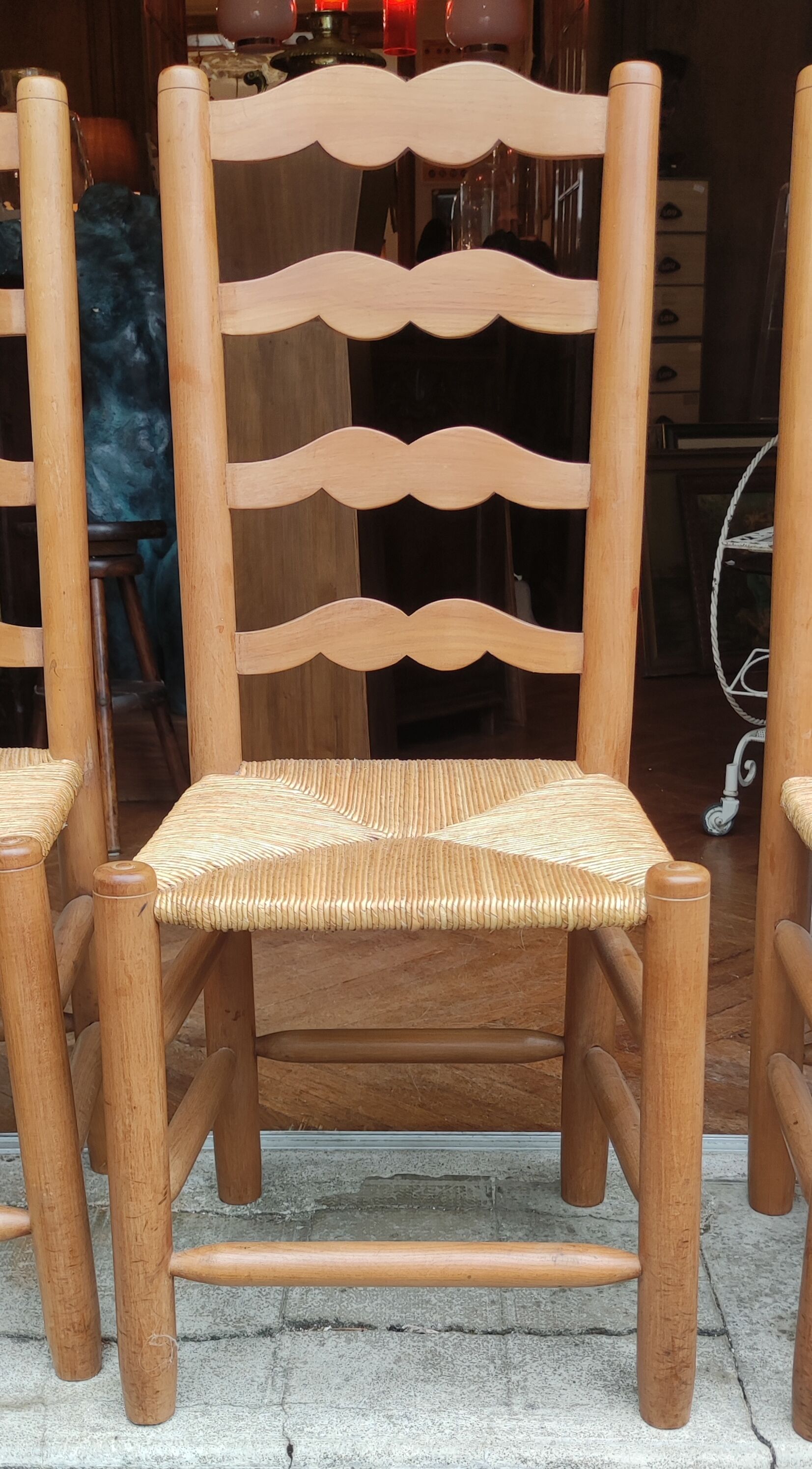 Series of 4 antique mulched chairs