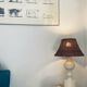 Large turned white wooden lamp