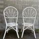 Pair of white peacock rattan chairs, circa 1960